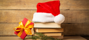 Santa hat on a stack of books