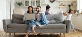 parents watching webinar on computer