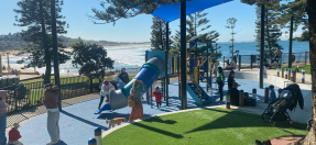 Families enjoying the revamped Michaela Howie playground